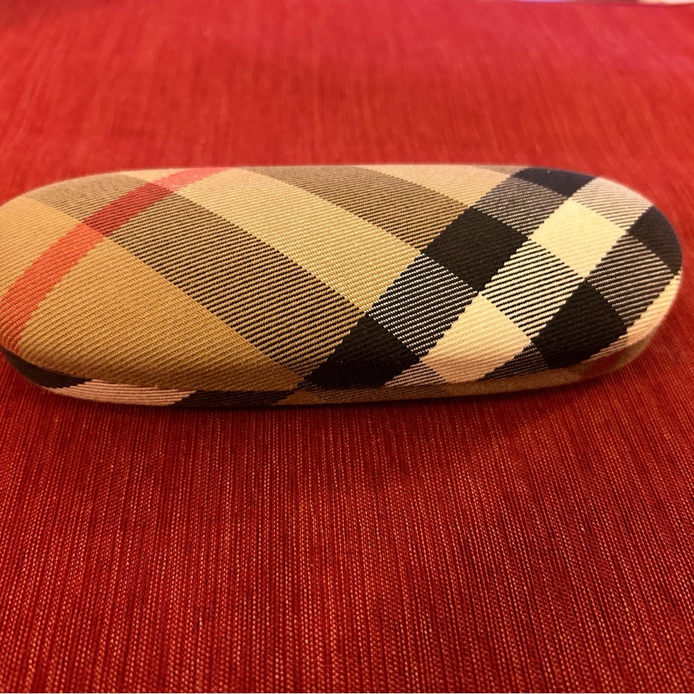 Burberry hard shell eyeglass case.